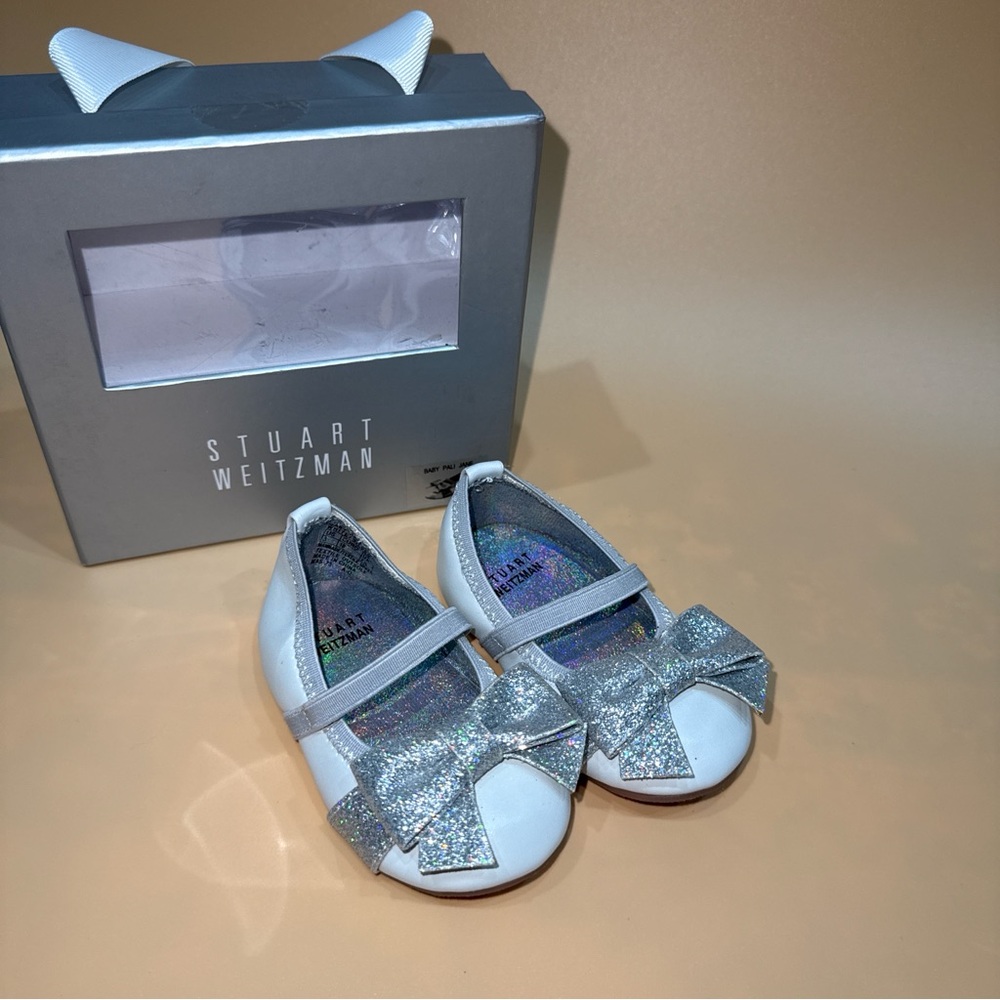 Stuart Weitzman Baby Pali White Silver Glitter Mary Jane Shoes
Size: 3 US baby